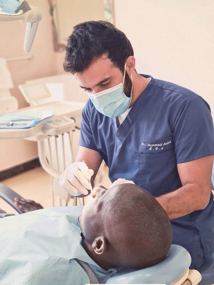 Dentist treating a patient